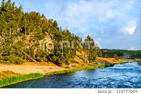 Iconic Firehole River at Midway Geyser Basin of Yellowstone National Park. UNESCO world heritage in Wyoming, United States 119777004
