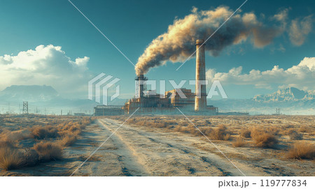 A large industrial power plant with smokestacks releasing smoke, set against a dry, desert landscape 119777834