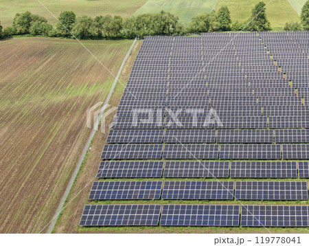 Aerial view of a solar farm, renewable energy and photovoltaic technology Aerial view of a solar farm, renewable energy and photovoltaic technology 119778041