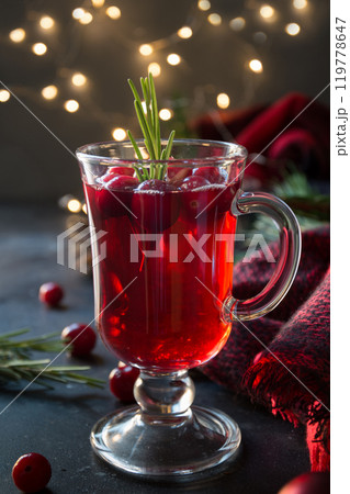 Christmas cranberry and apple mulled wine garnish rosemary and fir branches on black. Close up. Xmas drink. 119778647