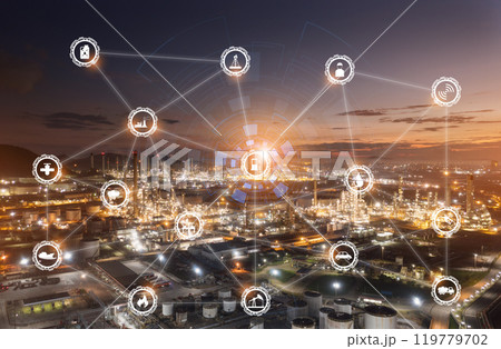 Aerial view or top view night light oil terminal is industrial facility for storage of oil and petrochemical for transport and business transportation. icons oil refinery and technology concept. Aerial view or top view night light oil terminal is industrial facility for storage of oil and petrochemical for transport and business transportation. icons oil refinery and technology concept. 119779702