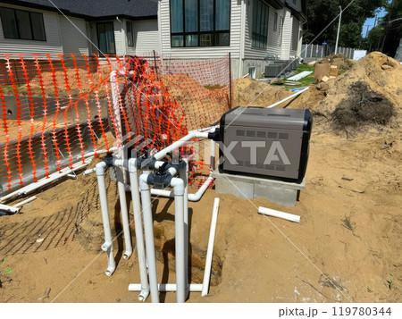 Installation of system boiler heats pool water 119780344