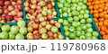 Fruits, green and red apples and tangerine in box on the market. 119780968