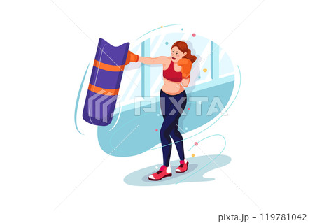Female boxer practicing using a punching bag 119781042