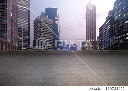 Empty rooftop balcony with view of modern building skyscrapers and futuristic architecture with sunset scene Empty rooftop balcony with view of modern building skyscrapers and futuristic architecture with sunset scene 119783422