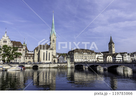 Scenic view of historic Zurich city center with famous Fraumunster and river Limmat at Lake Zurich,Switzerland 119783866