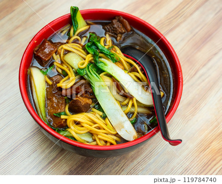 Bowl of ramen with wheat noodles, veal, mushrooms, chard 119784740