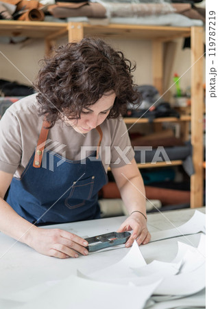 Woman tanner at work in the workshop.  119787219