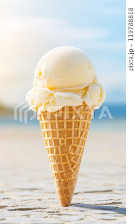 Creamy vanilla ice cream in waffle cone, set against beautiful beach backdrop. sunlit scene evokes sense of summer joy and indulgence 119788818