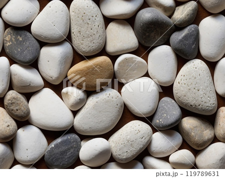Seamless grey, black and white pebble pattern or tile river stone background. Close-up image of stones. 119789631