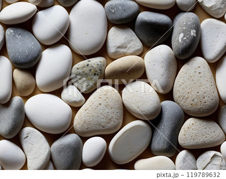 Seamless grey, black and white pebble pattern or tile river stone background. Close-up image of stones. 119789632