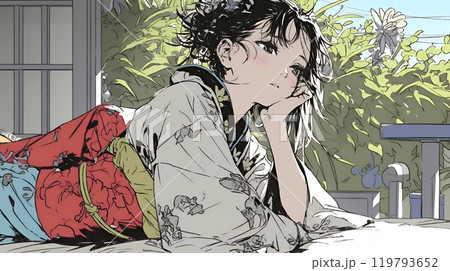 和服姿で寝そべる若い女性