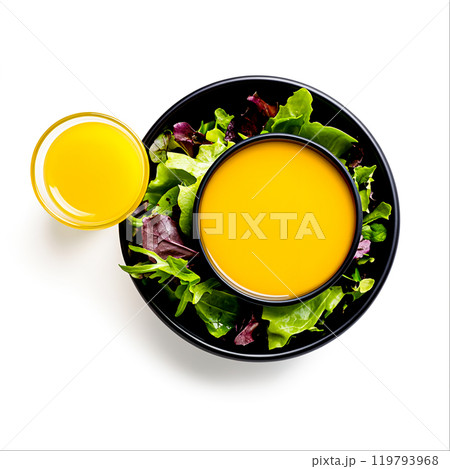 Fresh Salad and Vibrant Dressing on White Background 119793968