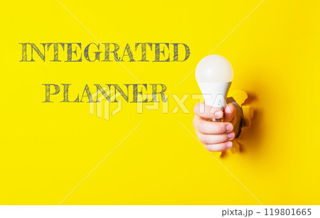 A person holding a light bulb with the words Integrated Planner written below A person holding a light bulb with the words Integrated Planner written below 119801665