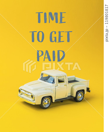 A toy truck with the words Time to get paid written on it 119801817