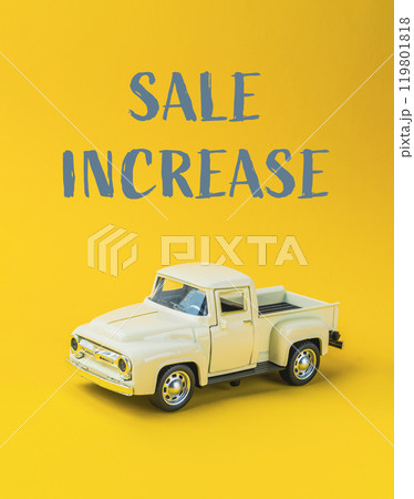 A toy truck is on a yellow background with the words Sale Increase 119801818