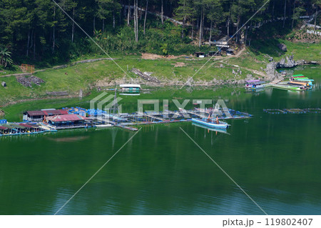 floating restaurant complex on Telaga Menjer, Wonosobo. 119802407