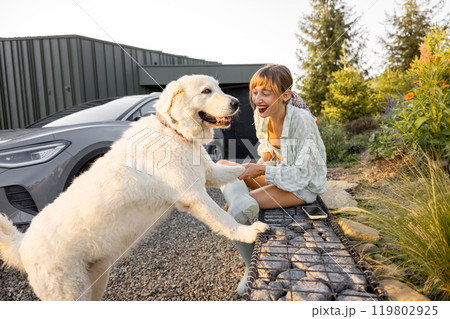 Joyful Bond with a Furry Friend Joyful Bond with a Furry Friend 119802925