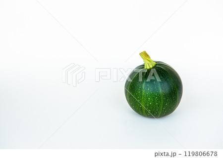 Green zucchini or round courgette, cucurbita pepo on white background Green zucchini or round courgette, cucurbita pepo on white background 119806678