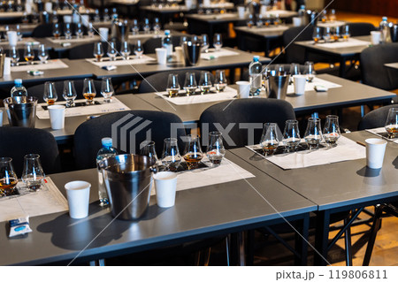 Exploring diverse flavors at an alcohol tasting event in a stylish venue 119806811