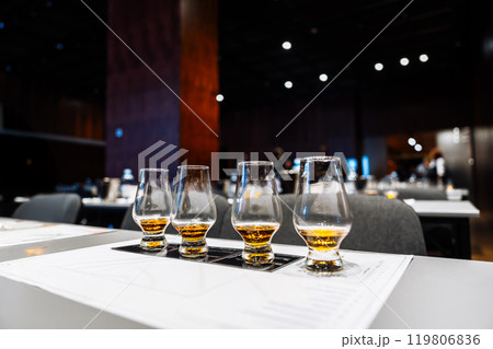 Explore the art of alcohol tasting and cocktail preparation in a modern venue Explore the art of alcohol tasting and cocktail preparation in a modern venue 119806836