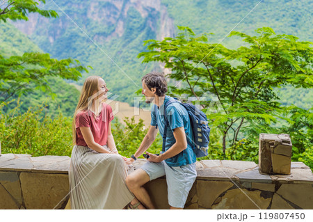 Man and woman embracing and admiring the view of Sumidero Canyon National Park, Mexico. Love, honeymoon, nature, and travel experience concept 119807450
