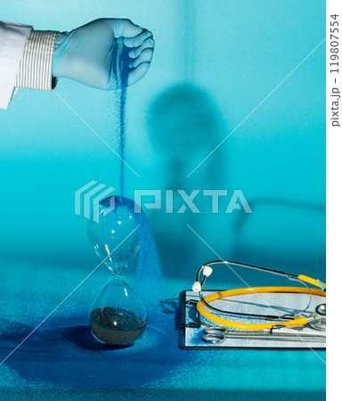 Medical technology, we can now extend more time to people's life, The goal of medicine is to prolong more time to people's lives and improve their quality of life. Doctor pouring sand to hourglass 119807554