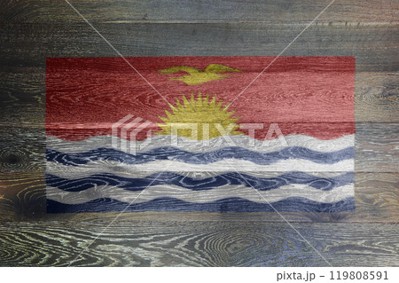 Kiribati flag on rustic old wood surface background 119808591