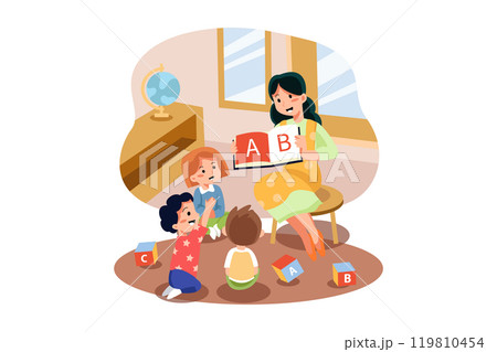 Playschool Teacher Teaching Alphabets To Kids 119810454