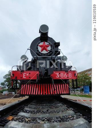 Vintage steam locomotive on rails Vintage steam locomotive on rails 119810589