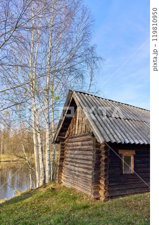 Abandoned Russian Bathhouse with Birches by Autumn River Abandoned Russian Bathhouse with Birches by Autumn River 119810950