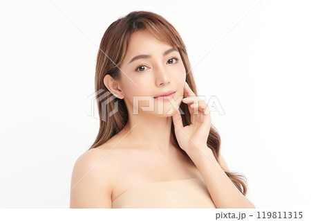 Beautiful young asian woman with clean fresh skin on white background, Face care, Facial treatment, Cosmetology, beauty and spa, Asian women portrait. Beautiful young asian woman with clean fresh skin on white background, Face care, Facial treatment, Cosmetology, beauty and spa, Asian women portrait. 119811315