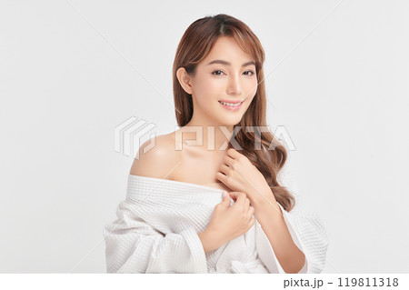 Beautiful young asian woman with clean fresh skin on white background, Face care, Facial treatment, Cosmetology, beauty and spa, Asian women portrait. Beautiful young asian woman with clean fresh skin on white background, Face care, Facial treatment, Cosmetology, beauty and spa, Asian women portrait. 119811318