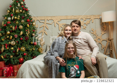 happy fun family girl couple celebration gift bed new tenderness year love positive holiday man 119812321