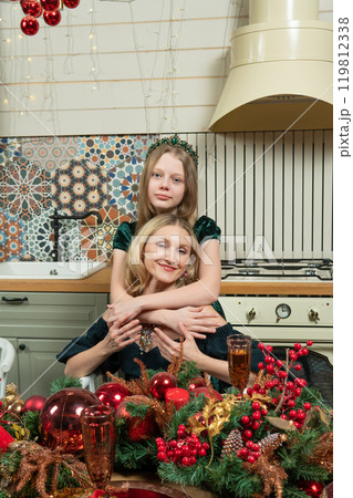 kitchen home table together happy new family year little winter children biscuit season 119812338