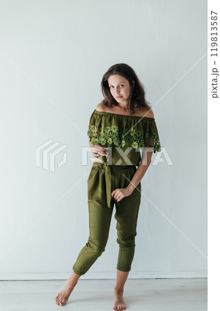 Beautiful Fashionable Slim Brunette Woman Smiling on White Background Portrait Beautiful Fashionable Slim Brunette Woman Smiling on White Background Portrait 119813587