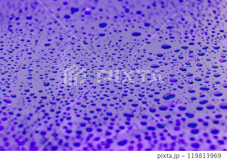 Clear water droplets on maroon and blue gradient color cover background. Water droplets concept 119813969