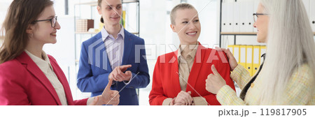 Boss and colleagues applaud to greet employee achievement Boss and colleagues applaud to greet employee achievement 119817905