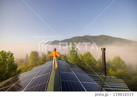 Walking on Solar Panels: Morning Mist and Mountain View Walking on Solar Panels: Morning Mist and Mountain View 119818315
