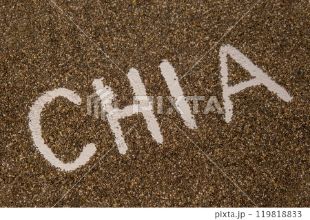 Word CHIA seeds background. Healthy superfood rich in Omega 3 fatty acids. Dry healthy natural ingredient. Vegetarian food favorite dietary Word CHIA seeds background. Healthy superfood rich in Omega 3 fatty acids. Dry healthy natural ingredient. Vegetarian food favorite dietary 119818833