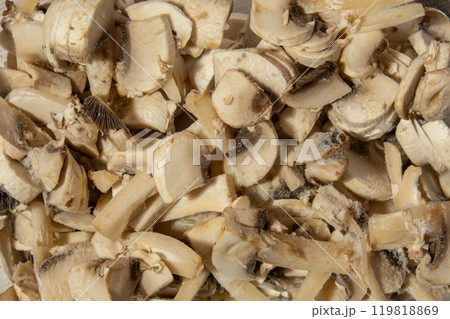 Background made of Frozen food sliced mushrooms champignon homemade. Harvesting concept. Stocking up vegetables for winter storage 119818869