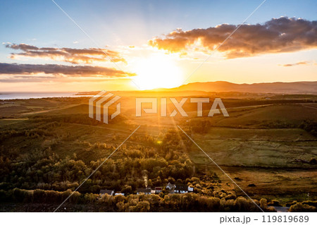 Aerial view of beautiful sunset above Tonregee between Dunkineely and Inver in County Donegal, Republic of Ireland. 119819689