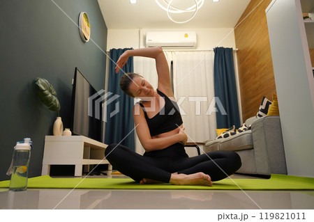 A young woman have a joyfully yoga practice A young woman have a joyfully yoga practice 119821011