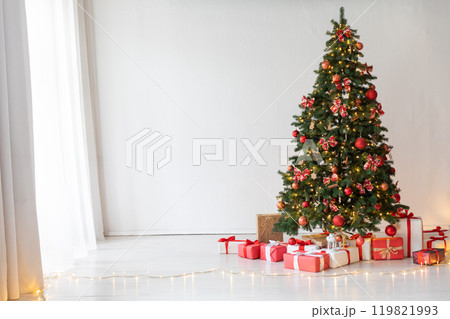 Christmas tree with gifts decorated with toys in the interior for the new year 119821993