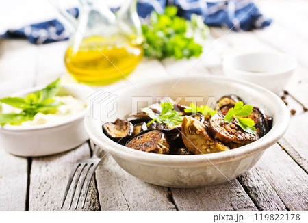 fried egg plant with fresh greens fried egg plant with fresh greens 119822178