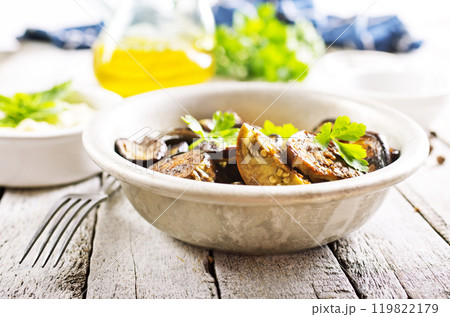 fried egg plant with fresh greens fried egg plant with fresh greens 119822179