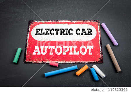 Autopilot. Sign with text and colored pieces of chalk on a dark chalkboard background 119823363