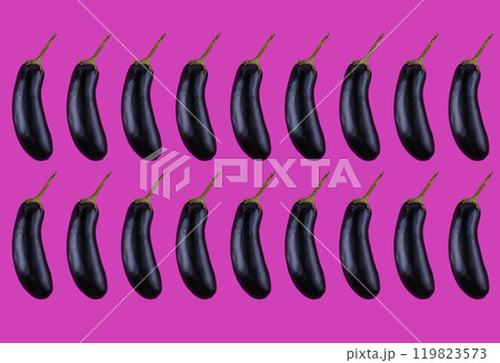 Rows of glossy black eggplants on vibrant pink 119823573
