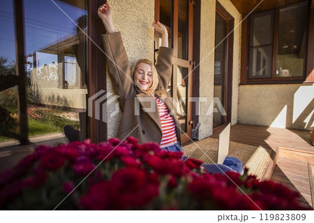 Work-Life Balance Outdoor. Combining work and relaxation on the balcony, surrounded by autumn colors. 119823809