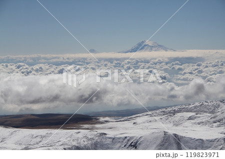 Aerial view of the snow-capped Mount Kilimanjaro above the clouds in Tanzania, Africa 119823971